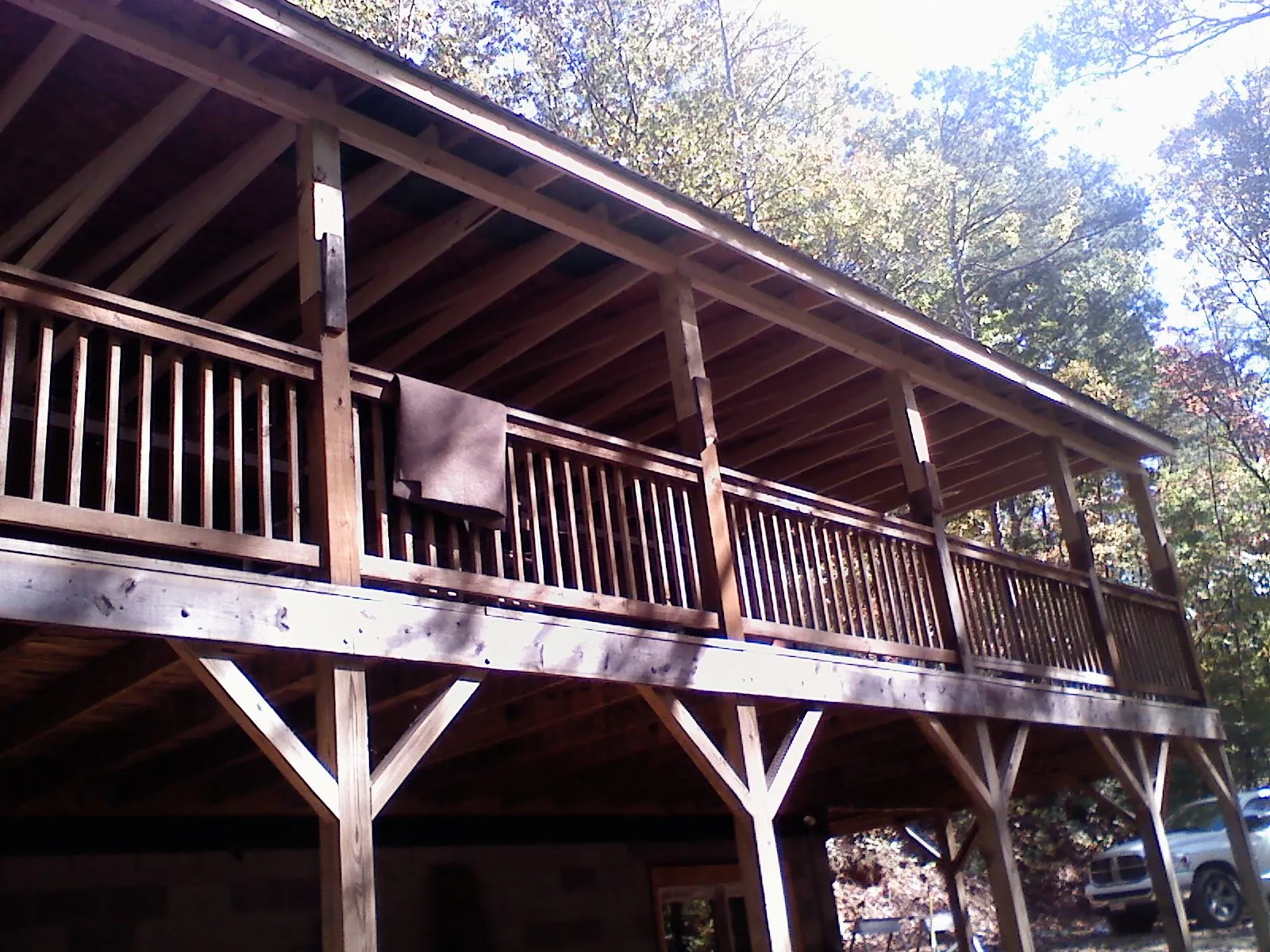 Timber framing under a new elevated porch and deck — Roof Leak Repair in Slingerlands by Roofing Brothers